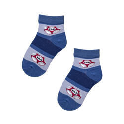 Niebieskie skarpetki w piłki